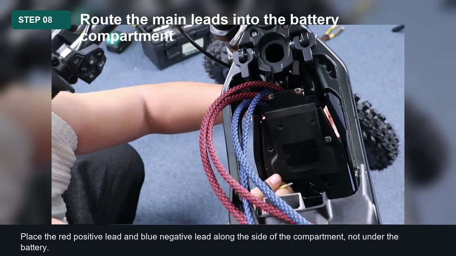 Light Bee Battery Discharge Cable Installation Guide: Step 08, Route the main leads into the battery compartment